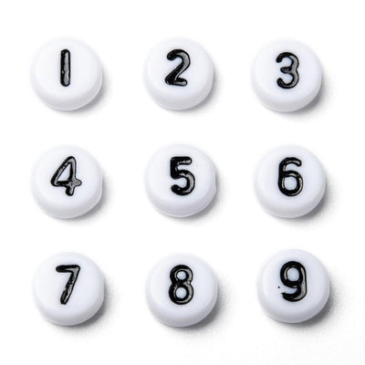 חרוזי מספרים לבן שחור, 7 מ"מ, חור 1.2 מ"מ, כ-100 יחידות