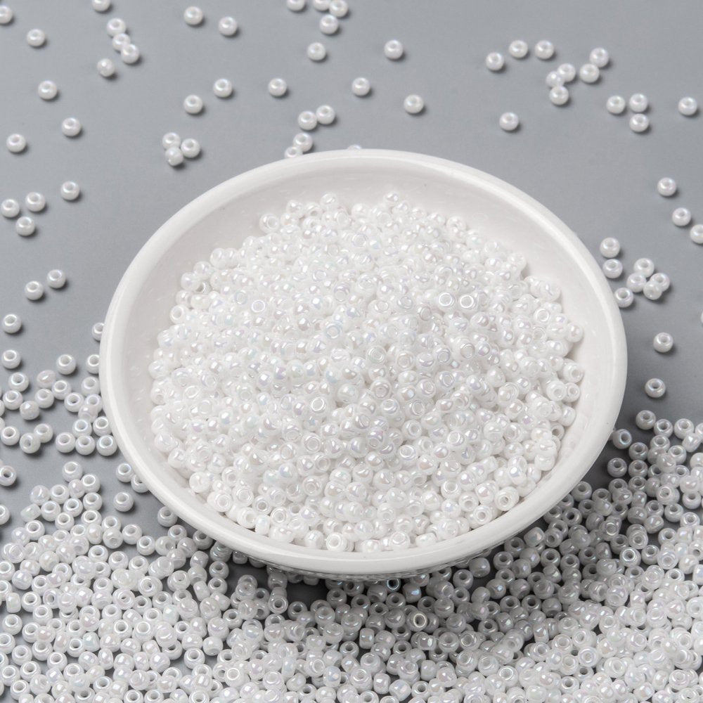 חרוזים יפנים מיוקי בצבע לבן פנינה, 3 מ"מ, חור 1 מ"מ - 10 גרם בחבילה (כ420 חרוזים)