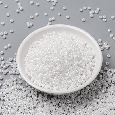 חרוזים יפנים מיוקי בצבע לבן פנינה, 3 מ"מ, חור 1 מ"מ - 10 גרם בחבילה (כ420 חרוזים)