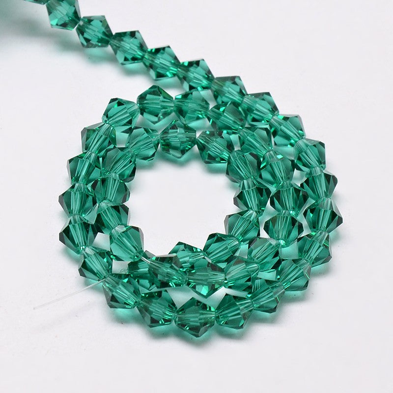 חרוזי זכוכית חיתוך יהלום צבע ירוק שקוף 4 מ"מ
